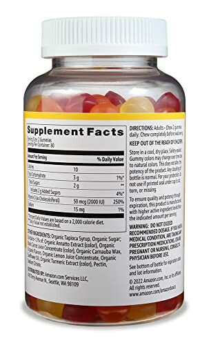 Bottle of vitamin gummies with supplement facts label